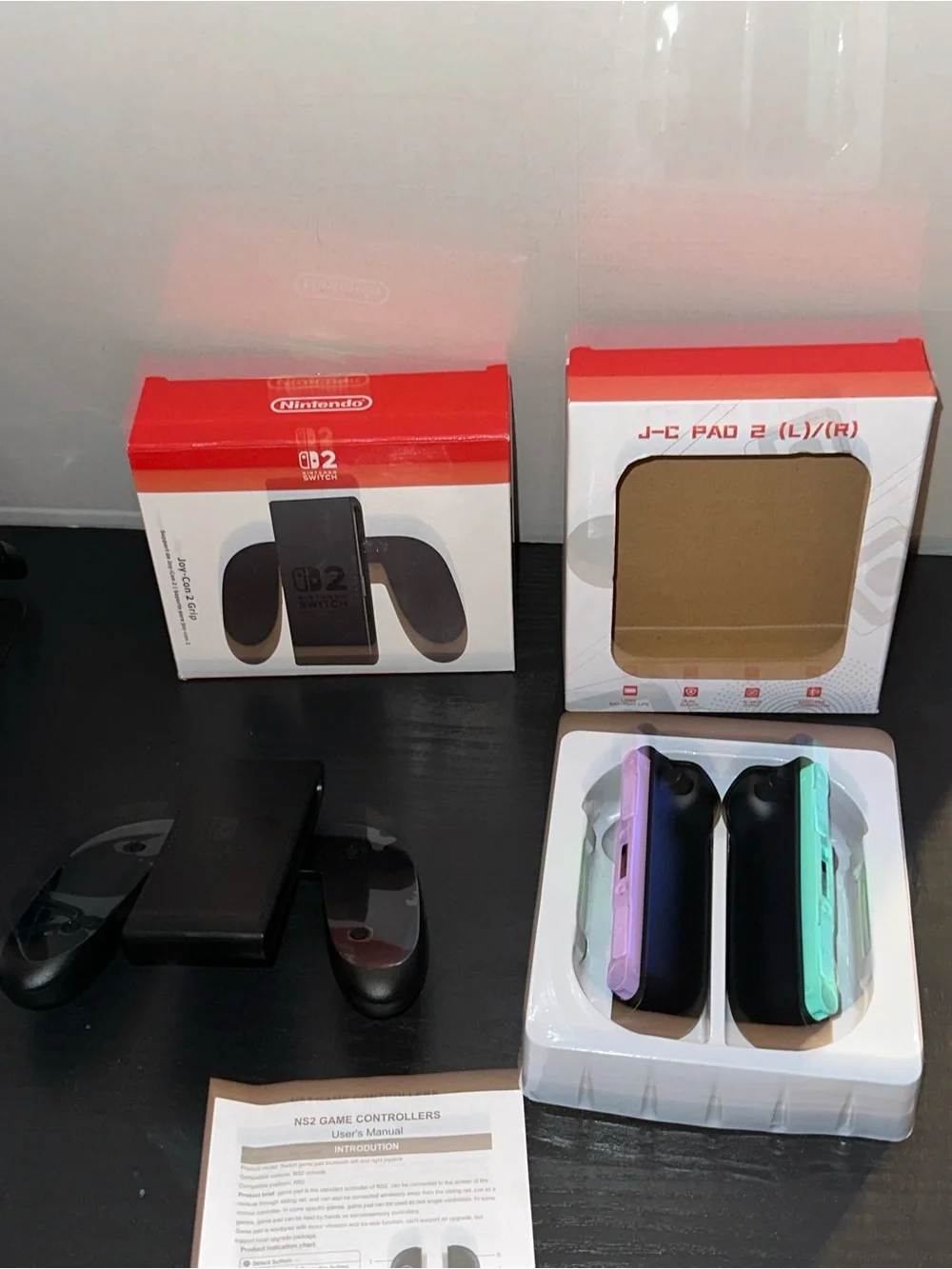 Nintendo Wireless Joy-Con Blue and Orange Accents with Nintendo game grip